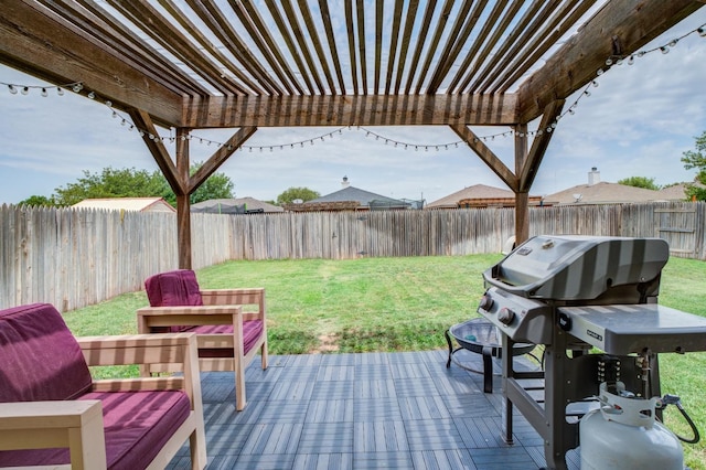 view of patio featuring area for grilling and a pergola