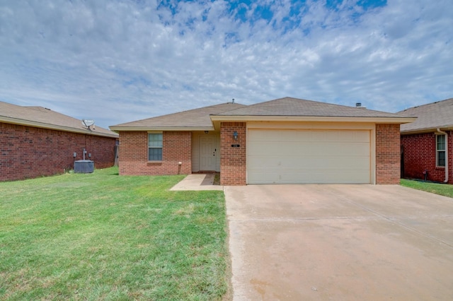 ranch-style home featuring central AC unit, a garage, and a front yard