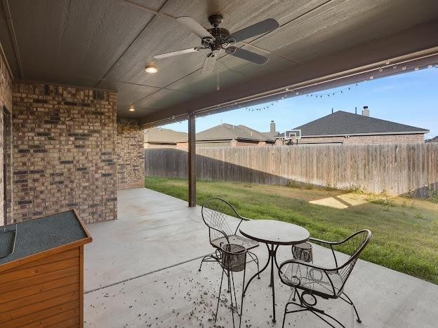 view of patio / terrace with ceiling fan