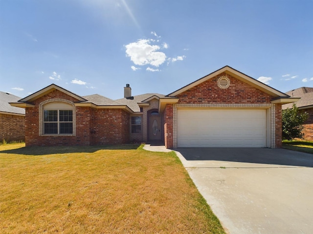 ranch-style home with a garage and a front yard