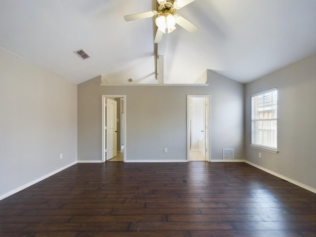 unfurnished room featuring lofted ceiling, dark hardwood / wood-style floors, and ceiling fan