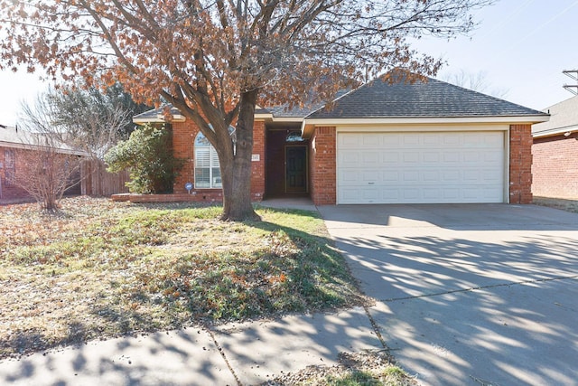 ranch-style home with a garage