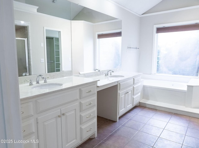 4420 87th St, Lubbock, TX 79424 - full bathroom featuring vaulted ceiling, healthy amount of natural light, tile patterned floors, crown molding, and a stall shower