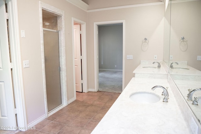 4420 87th St, Lubbock, TX 79424 - full bathroom with crown molding, a stall shower, double vanity, baseboards, and tile patterned floors