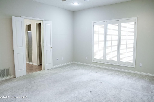 4420 87th St, Lubbock, TX 79424 - spare room with carpet flooring, a ceiling fan, and baseboards