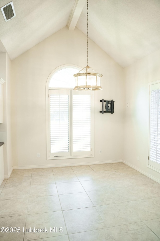 4420 87th St, Lubbock, TX 79424 - unfurnished dining area with light tile patterned flooring and baseboards