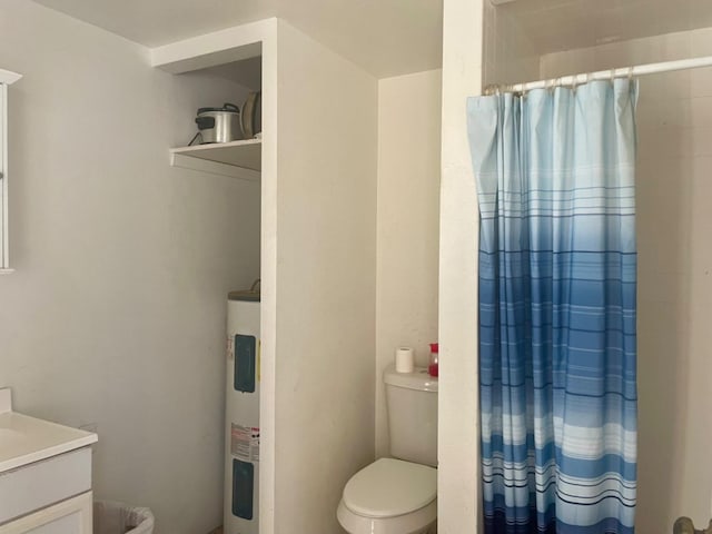 bathroom featuring vanity, electric water heater, toilet, and a shower with shower curtain