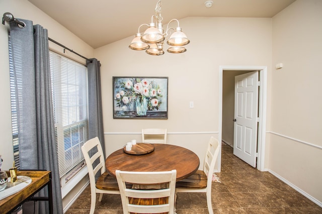 3602 Pontiac Ave, Lubbock, TX 79407 - dining area with vaulted ceiling, baseboards, and an inviting chandelier