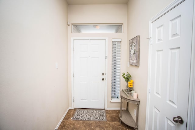 3602 Pontiac Ave, Lubbock, TX 79407 - doorway to outside featuring baseboards