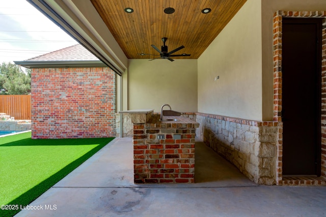 3913 106th St, Lubbock, TX 79423 - view of patio featuring ceiling fan and a sink