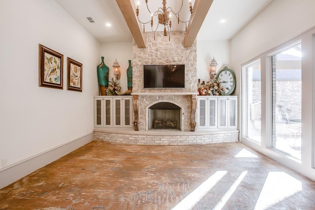 unfurnished living room featuring an inviting chandelier, hardwood / wood-style floors, beam ceiling, and a large fireplace