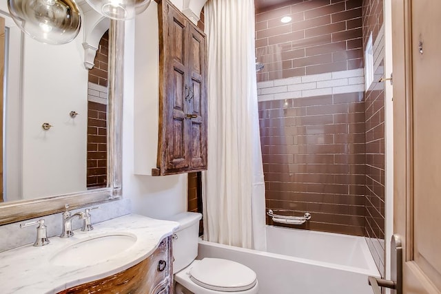 full bathroom with vanity, toilet, and shower / bath combo with shower curtain