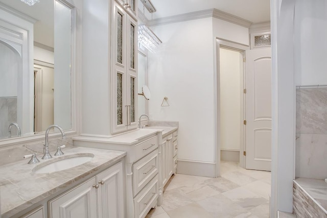 bathroom featuring vanity and ornamental molding