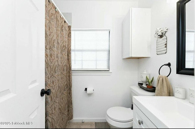 1502 30th St, Lubbock, TX 79411 - full bath featuring vanity and toilet