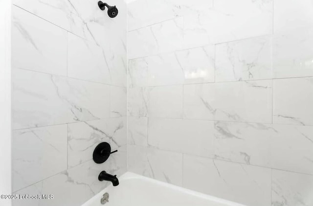 1502 30th St, Lubbock, TX 79411 - bathroom with bathing tub / shower combination