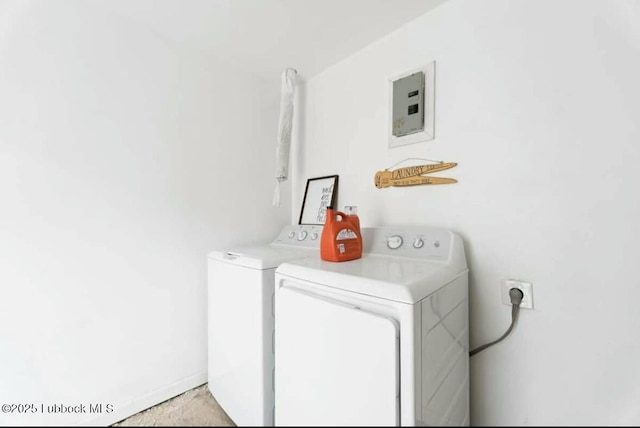 1502 30th St, Lubbock, TX 79411 - laundry room featuring washer and dryer and electric panel