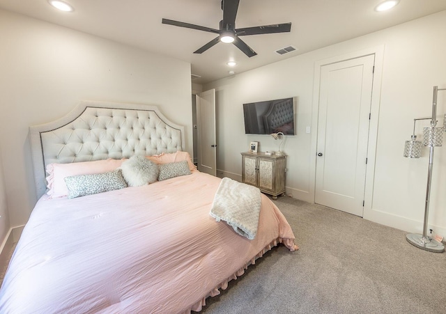 carpeted bedroom with ceiling fan