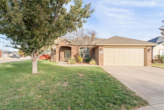 single story home featuring a garage and a front lawn