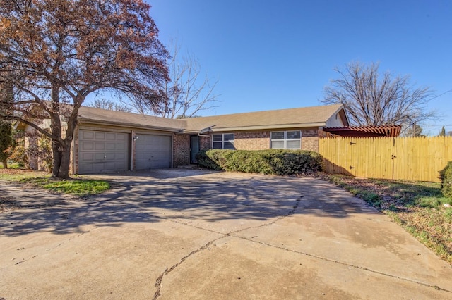 ranch-style home with a garage