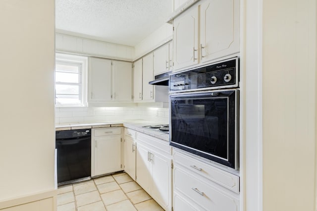 kitchen featuring light tile patterned floors, white cabinetry, black appliances, a textured ceiling, and decorative backsplash