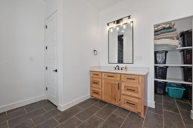 bathroom with vanity and tile patterned floors