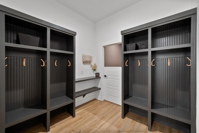 mudroom with hardwood / wood-style flooring