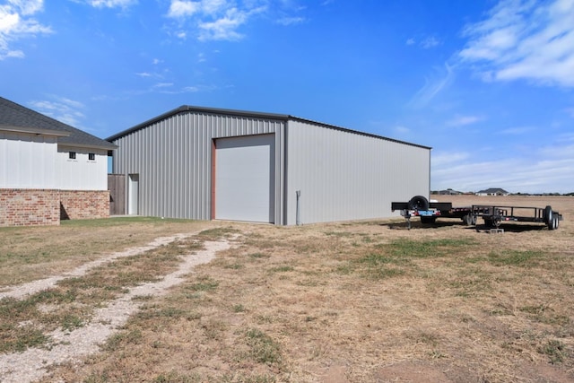 view of outbuilding featuring a garage