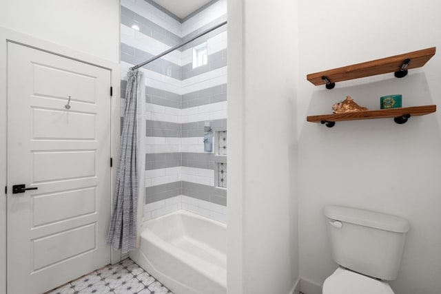 bathroom with toilet and shower / bath combo