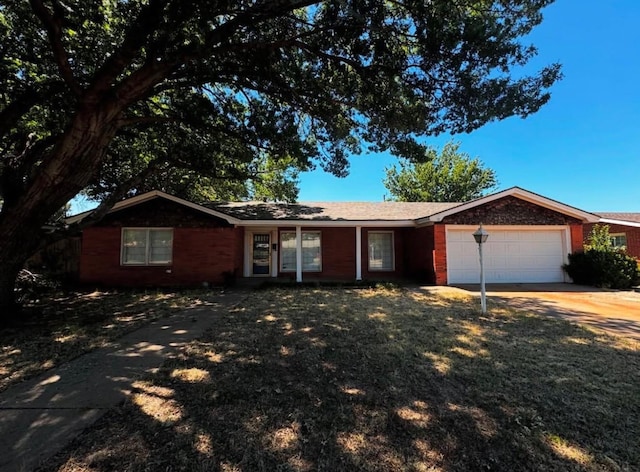 single story home featuring a garage