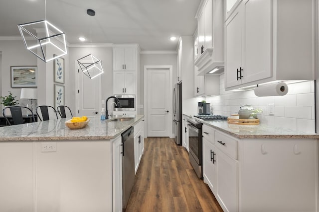 kitchen with white cabinetry, crown molding, a kitchen island with sink, and appliances with stainless steel finishes