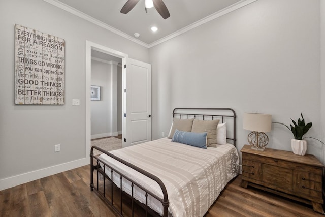 bedroom featuring ornamental molding, dark wood-type flooring, and ceiling fan