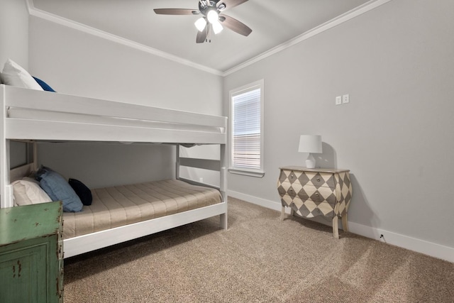 bedroom with carpet floors, ornamental molding, and ceiling fan