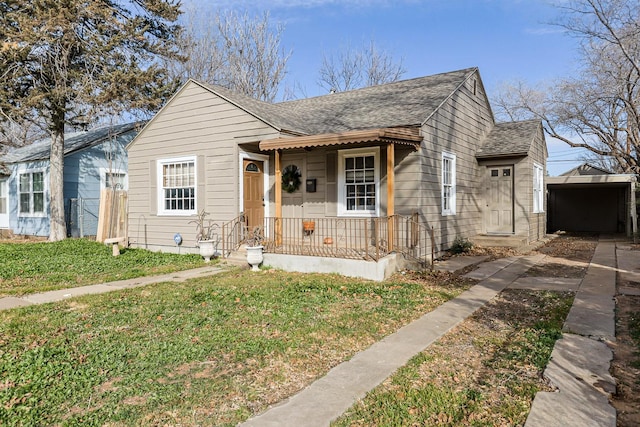 bungalow-style house featuring a front yard and a porch