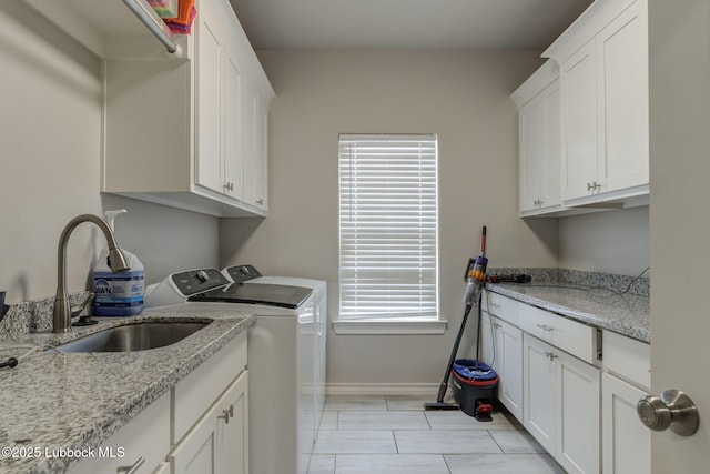 12010 N Crk 1500, Shallowater, TX 79363 - laundry area with washer and dryer, baseboards, and cabinet space