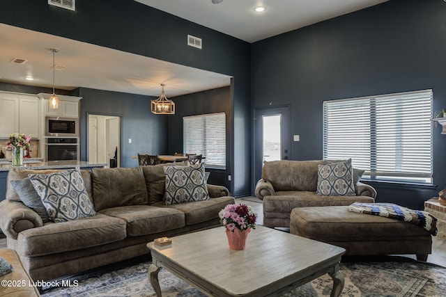 12010 N Crk 1500, Shallowater, TX 79363 - living room featuring a chandelier and recessed lighting