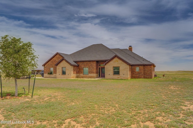 12010 N Crk 1500, Shallowater, TX 79363 - view of front of home with brick siding, a chimney, a front lawn, and a shingled roof