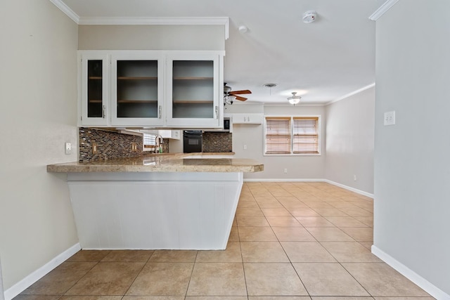 kitchen featuring white cabinetry, sink, ornamental molding, light tile patterned floors, and kitchen peninsula