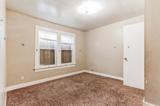 spare room featuring carpet flooring