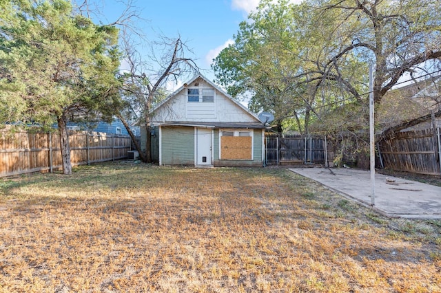 view of outbuilding featuring a yard