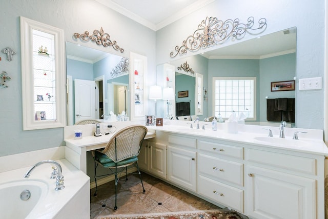 bathroom with tile patterned flooring, ornamental molding, a washtub, and vanity