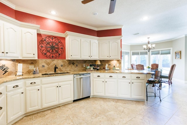 kitchen featuring sink, white cabinetry, hanging light fixtures, stainless steel dishwasher, and light stone countertops