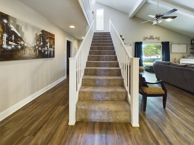 staircase featuring beamed ceiling, high vaulted ceiling, hardwood / wood-style floors, and ceiling fan