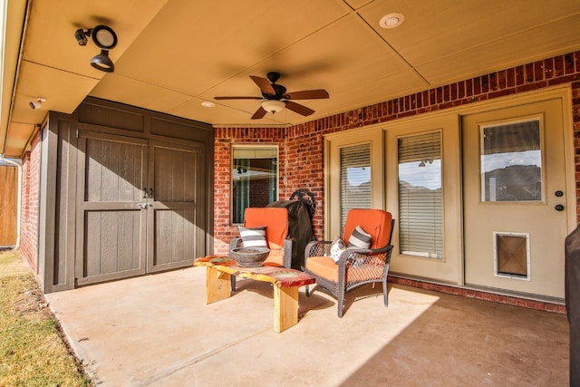 view of patio / terrace featuring ceiling fan