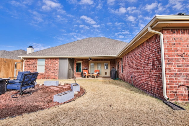 back of house with a yard