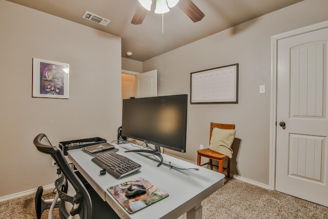 home office with carpet floors and ceiling fan