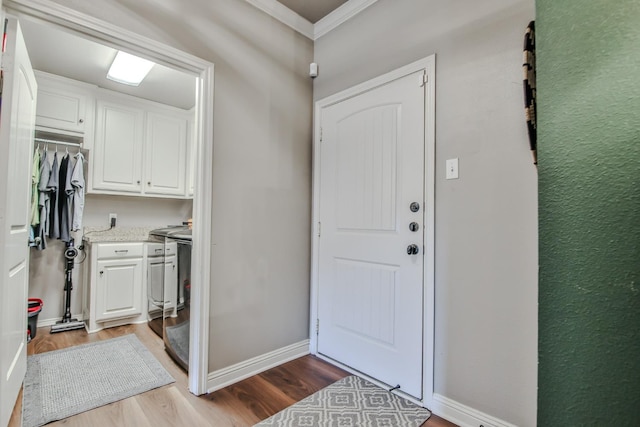 interior space with crown molding and light wood-type flooring