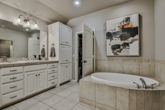 bathroom with vanity, tile patterned floors, and independent shower and bath