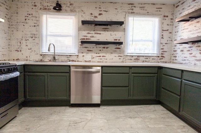 kitchen featuring sink, green cabinetry, and appliances with stainless steel finishes