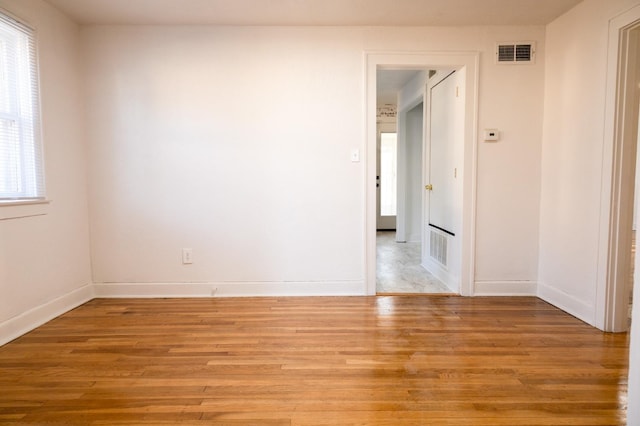 unfurnished room featuring light hardwood / wood-style flooring