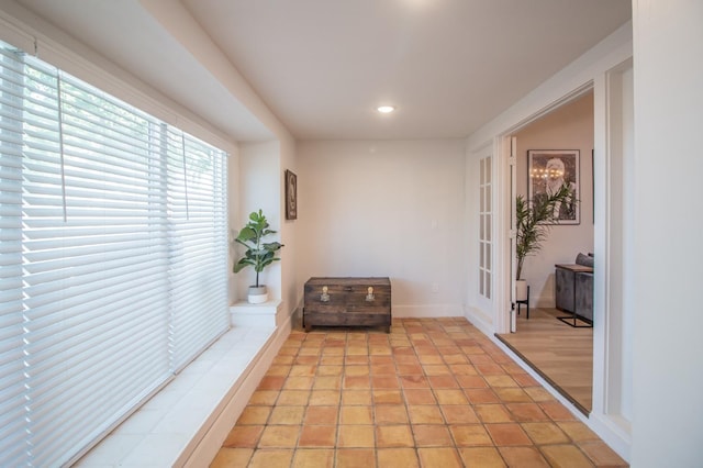 interior space featuring light tile patterned floors